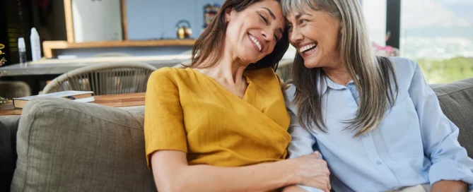 Daughter Hugging Senior Mom